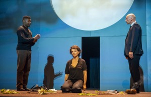 A scene from Antigone by Sophokles, directed by Ivo van Hove with Juliette Binoche, in a new translation by Anne Carson, at the BAM Harvey Theater on September 24, 2015. Actors: Juliette Binoche-Antigone Obi Abili_Black man Kirsty Bushell_Ismene_young women in skirt Samuel Edward-Cook_Haimon- Young bald man Finbar Lynch_Teiresias_Small thin wiry Patrick O'Kane_Kreon_bald man in suit Kathryn Pogson_Eurydike_older woman Nathaniel Jackson_dead body Credit: Stephanie Berger
